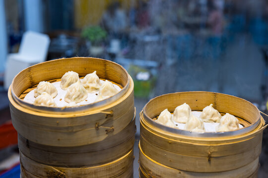 Steamed dumplings in bamboo steamers at Taiwan market