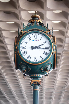 Adani branding on vintage Mumbai airport clock