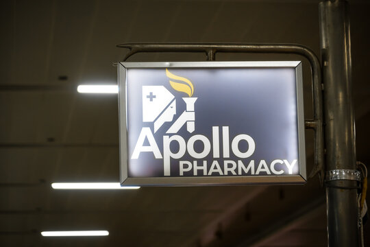 Apollo Pharmacy sign illuminating healthcare and retail services