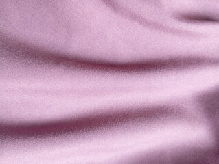 Fototapeta premium Soft pink cotton fabric texture with natural folds for design.
