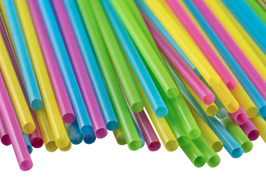 Colorful plastic drinking straws displaying vibrant party colors on a transparent background