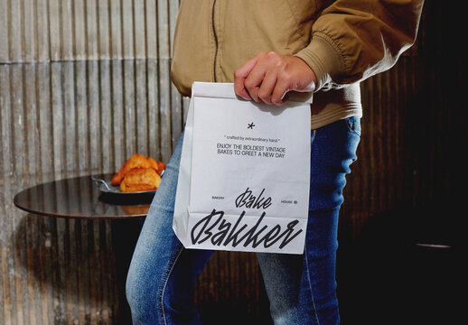 Holding Paper Bag Mockup