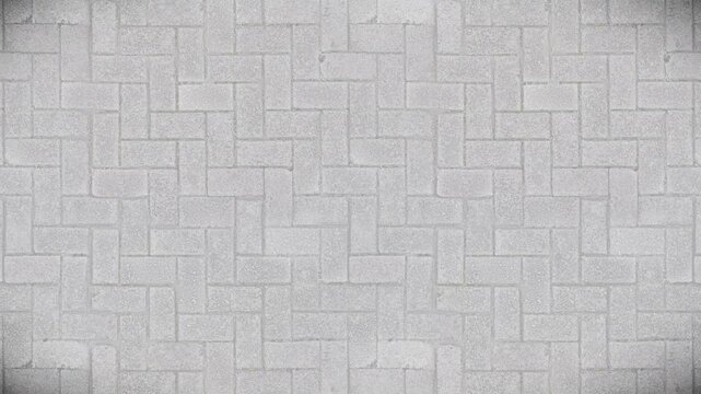 Bright grey herringbone paving pattern, infinite loop background.