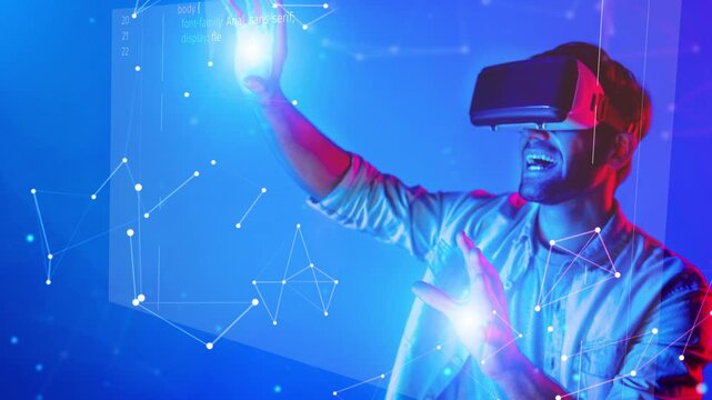 A man joyfully navigates a virtual world using a headset, illuminated by blue hues and surrounded by digital elements, showcasing the excitement of modern technology. Raster