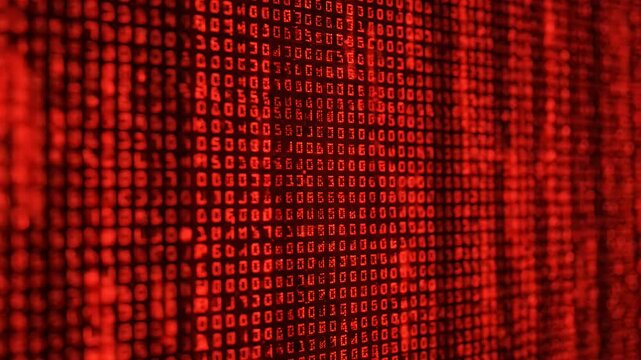 Red digital binary code pattern on dark background