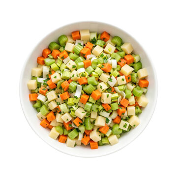 Diced vegetable soup mix in a bowl. Fresh chopped mirepoix ingredients isolated on white.
