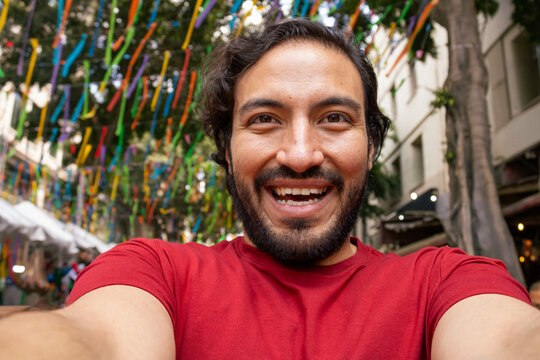 Exciting Close Up Selfie of a Young Man on a Festive Street