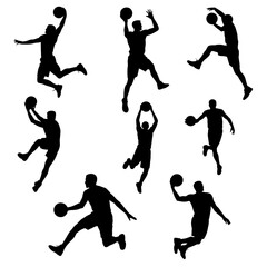 Basketball player silhouettes set jumping dunking and dribbling © Riyad