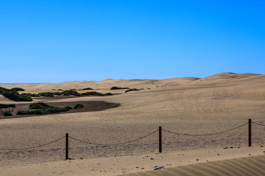 Panorama view of Maspalomas Dunes with footprints on Canary Island Gran Canaria, Spain