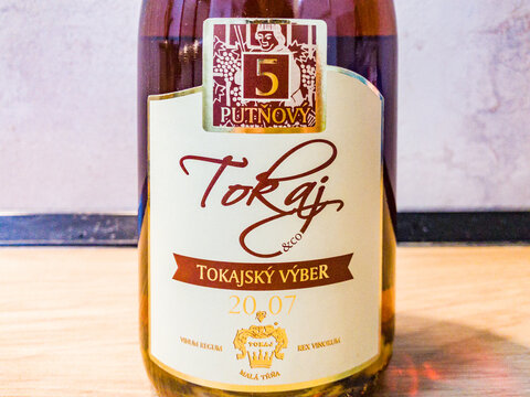 BARDEJOV, SLOVAKIA - FEBRUARY 10, 2026: A typical bottle of Slovak Tokaj wine Tokajsky vyber 5 putnovy vintage 2007 from the local wine region.