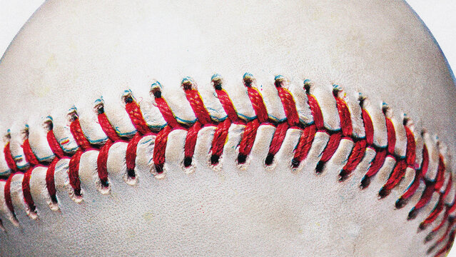 Close-up macro shot of a classic baseball seam with red stitching, highlighting texture and detail. Sports equipment, athletic game, leather texture, professional sport.