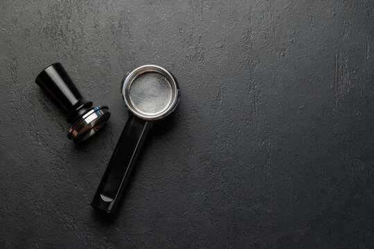 Espresso preparation tools and coffee beans flat lay composition
