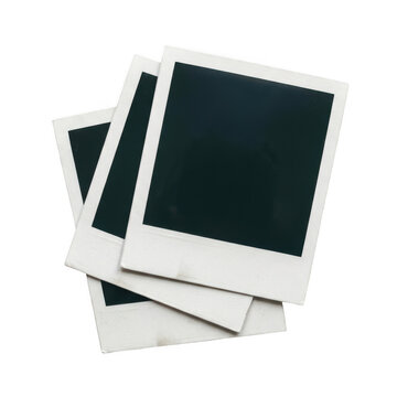Three blank instant polaroid photo frames stacked together