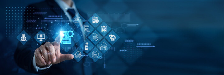 Fototapeta premium Clerk touches Document Management and cloud network storage access. This organizes vital files efficiently, allowing remote teams to collaborate on important projects without any delays.
