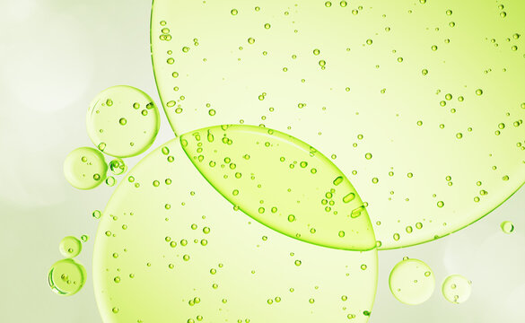 Light green gel texture 3d background, transparent cosmetic liquid drops with bubbles, round spot pattern. Bio oil, collagen serum droplet on surface top view. Beauty skincare product. 3D illustration