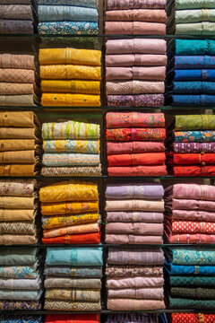 Colorful ethnic Indian wear clothing stacked on shelves