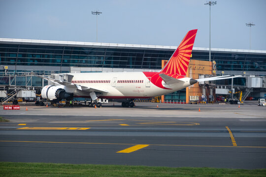 Air India Boeing 787 8 Dreamliner airplane parked at airport terminal