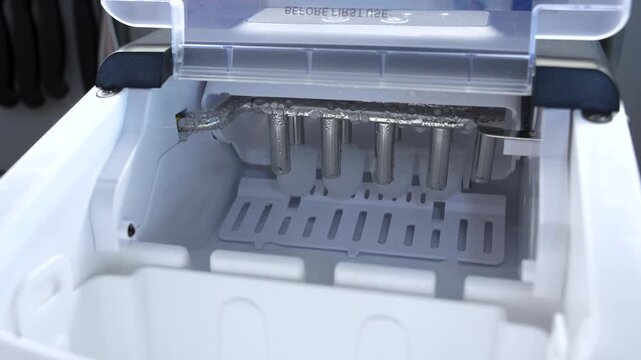 Compact ice maker dispensing fresh ice at home