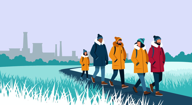Group of people walking in winter clothing.