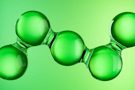3D render of a green molecular structure inspired by biology and laboratory research. Abstract natural molecule concept symbolizing environment, science, innovation, and modern biotechnology.