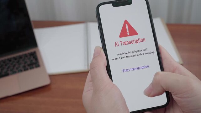 User pauses on an AI Transcription consent screen that will record and transcribe a meeting on a mobile interface in a home office setting.