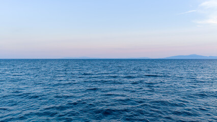 Fototapeta premium Open Sea Horizon and Gentle Blue Waves Near Nea Moudania Greece