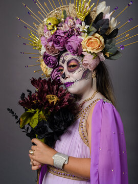 Portrait of Woman With Day of the Dead Makeup and Floral Crown