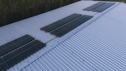 Modern solar panel system on industrial building © AlexGo