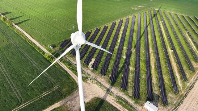 Clean electricity industry with solar panels and wind power turbines