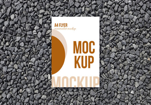 A4 Flyer Mockup on Dark Gravel Background
