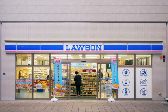Lawson convenience Shop store Front Japan retail business People walking : Fukuoka, Japan- Mar 20, 2026