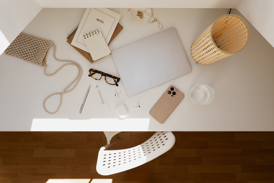 Clean Organized Workspace Setup With Laptop And Tech Accessories