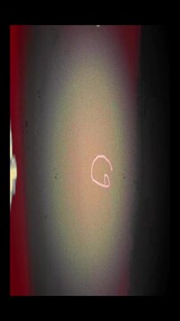 Warm Light Leaks and Grainy Textures. Authentic Retro 8mm Film Blinking Frame with Grainy Textures and Warm Light Leaks for Nostalgic Video Overlays 4k video
