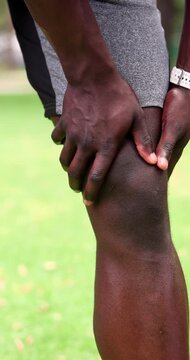 Fitness, hands and massage knee pain at park for muscle spasm, incorrect form or ligament sprain. Athlete, person and tendon discomfort from exercise accident, kneecap strain and patellar tendinitis