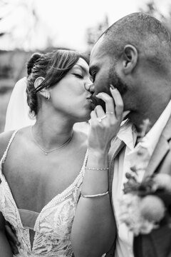Bride and groom share an intimate kiss