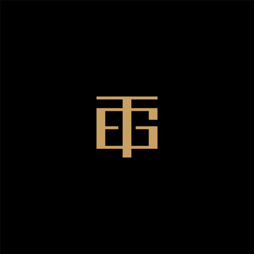 TEG monogram logo with gold color.