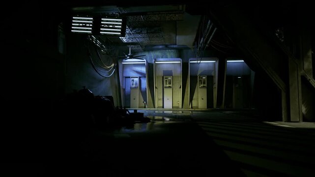 Cool blue service doors in shadowed underpass, narrow concrete approach illuminated by sparse LED glow. Pipes and utility boxes line walls, subtle reflections