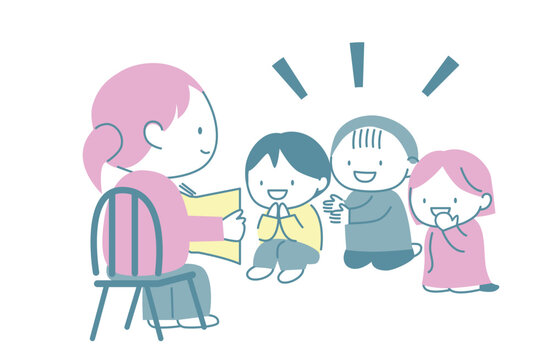 絵本の読み聞かせをしてもらって喜ぶ子供たち