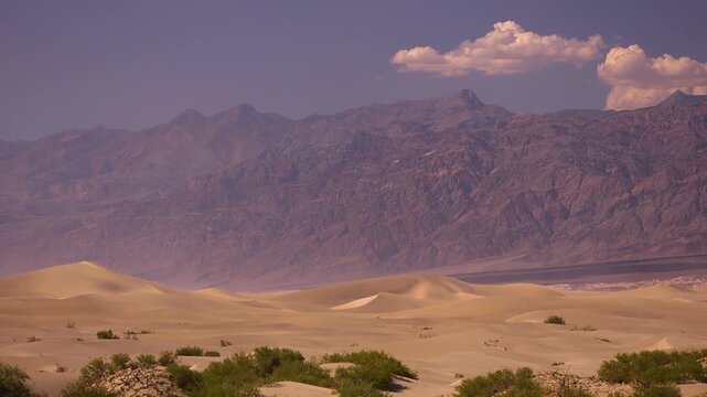 Death valley yellow sand and colored mountains