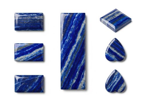 Polished lapis lazuli gemstones in various shapes on white background