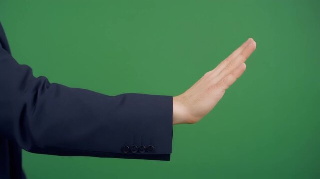 Professional corporate hand executing a smooth horizontal swipe right gesture against a green screen for business presentations, app navigation, and digital marketing overlays.