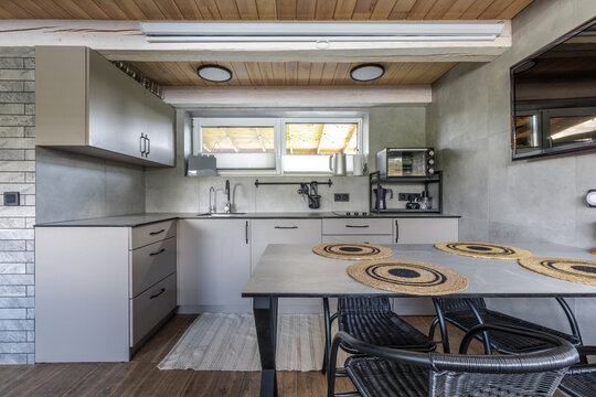 Modern Country House Kitchen Interior with Dining Table