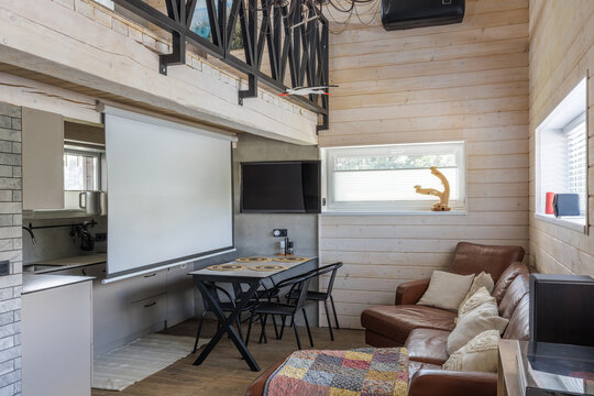 Modern Country House Living Room and Dining Area with Projector Screen
