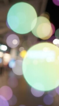 A Stunning Display of Blurred Colors and Shapes Highlighting the Ethereal Glow of Light Bokeh in an Urban Setting, Evoking a Dreamlike Atmosphere