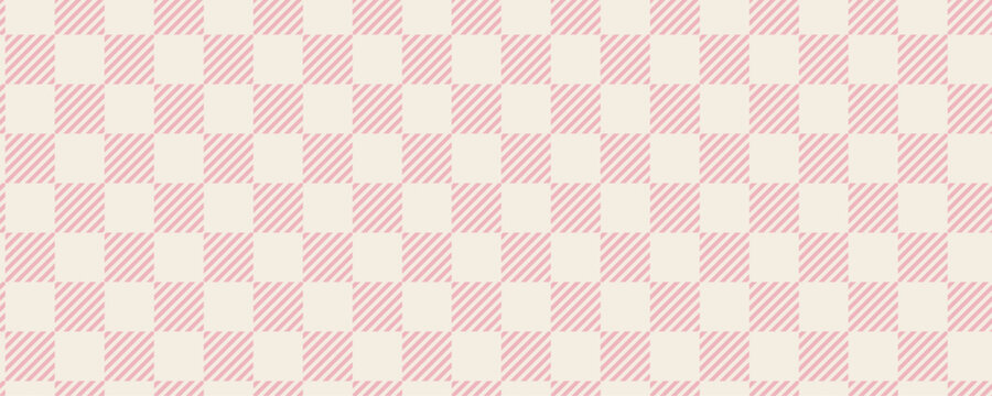 Pink and white checkered vichy plaid background. Cute fabric texture for tablecloths, napkins, blankets, and kids clothing.