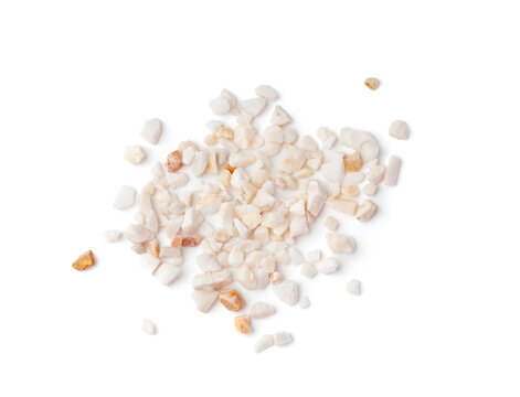 Crushed quartzite pebble pile isolated, white decorative marble stones