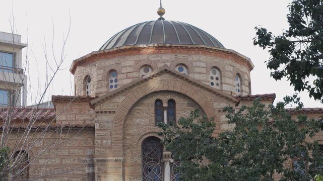 Dome of the Church of the Holy Trinity, a byzantine orthodox church in Athens, Greece. tilt up shot