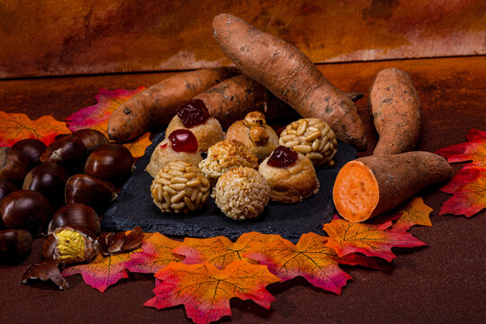 Celebrating castanyada with roasted chestnuts, sweet potatoes, and traditional panellets