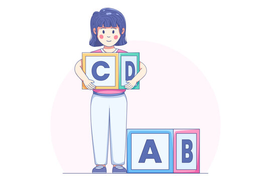 Young school girl holding alphabet blocks for early childhood education and literacy learning