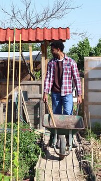 Multiethnic farmers working together in a community garden